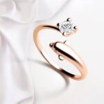 Rose gold minimalist adjustable ring with a tiny sparkling zircon stone.