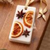 Handmade rectangular soy wax bar with dried flower petals, available in different scents.