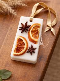 Handmade rectangular soy wax bar with dried flower petals, available in different scents.