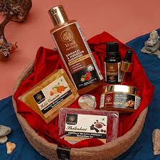 A relaxation gift set featuring a sheet mask, peach lip balm, and a floral wax bar.